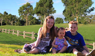 Solar battery supplier Choose Solar owners and family members standing together at their Melbourne facility